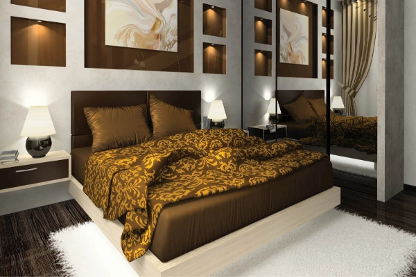 The-luxurious-brown-motif-and-the-plush-headboard-of-this-bedroom-take-elegance-to-the-next-level